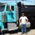 patrick_standing_with_10yd_truck-e1548187038318