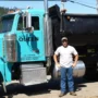 patrick_standing_with_10yd_truck-e1548187038318